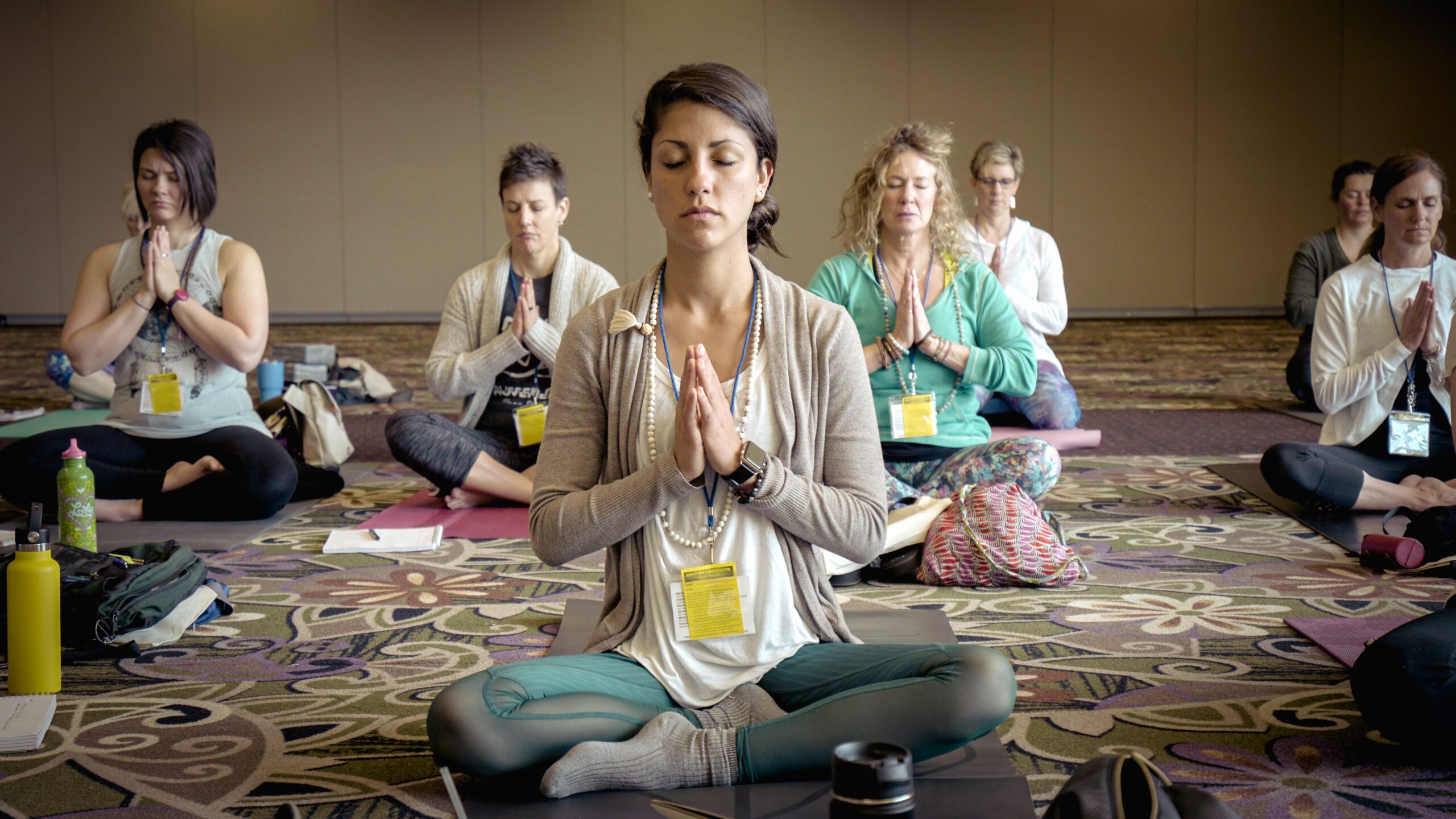 women holding yoga pose 