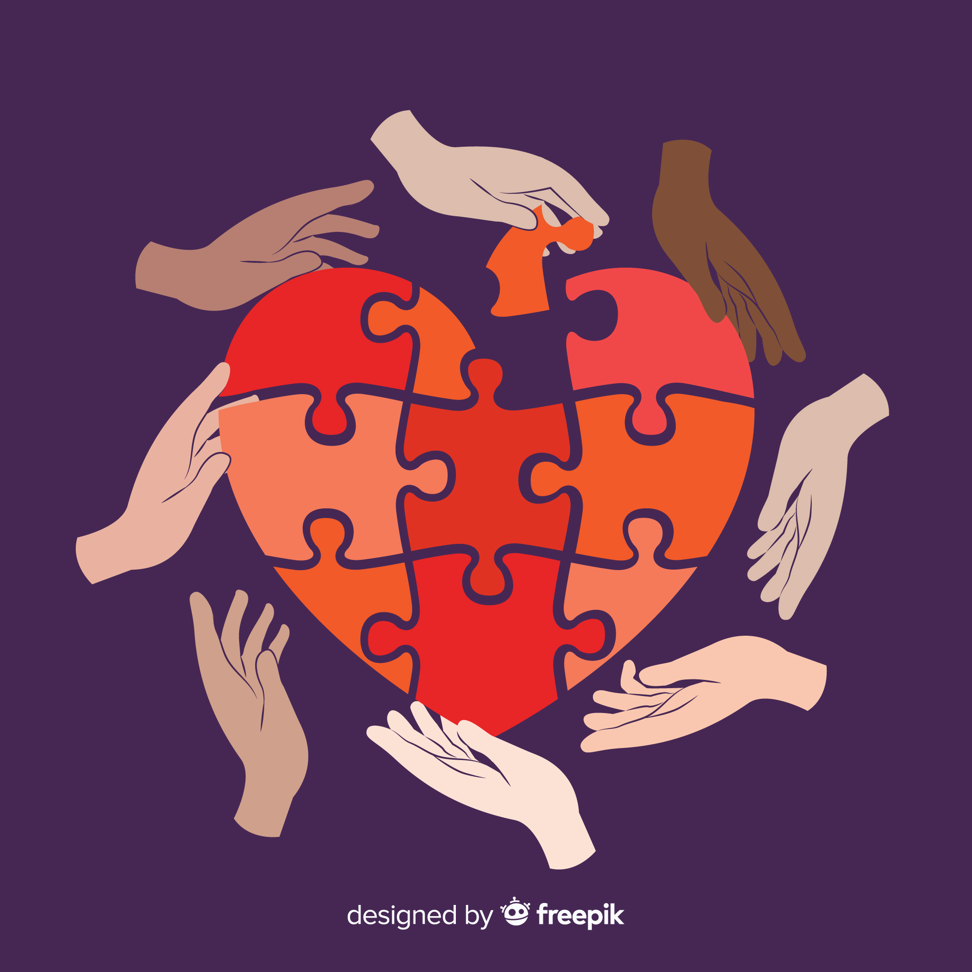 puzzle heart with diverse hands around