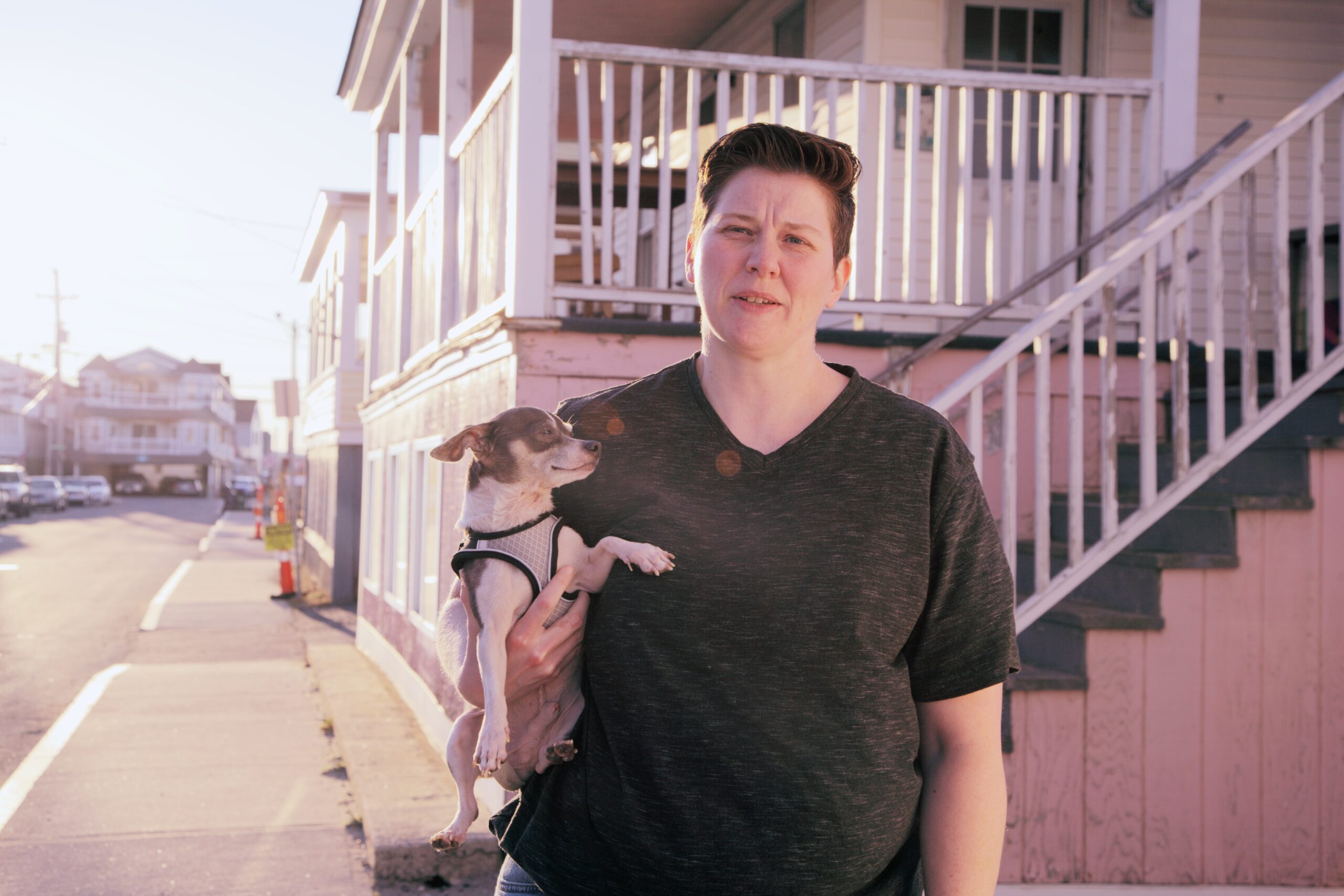 Image of a person holding a dog