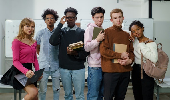 Multiethnic students standing in classroom