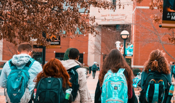 Students wearing backpacks