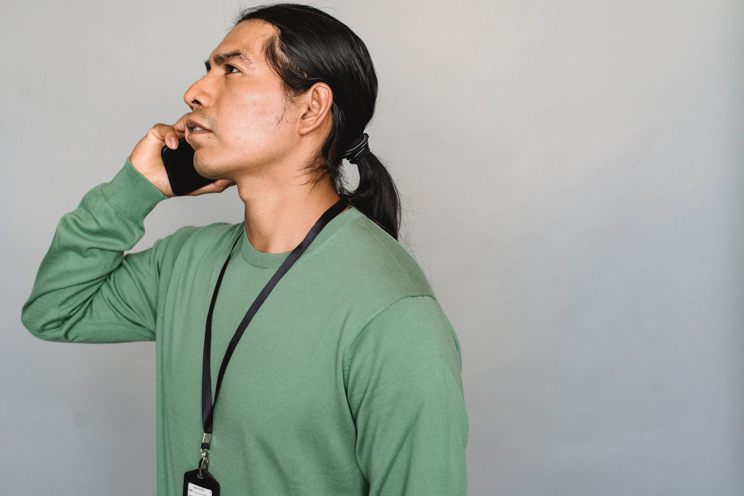 Native American man on phone