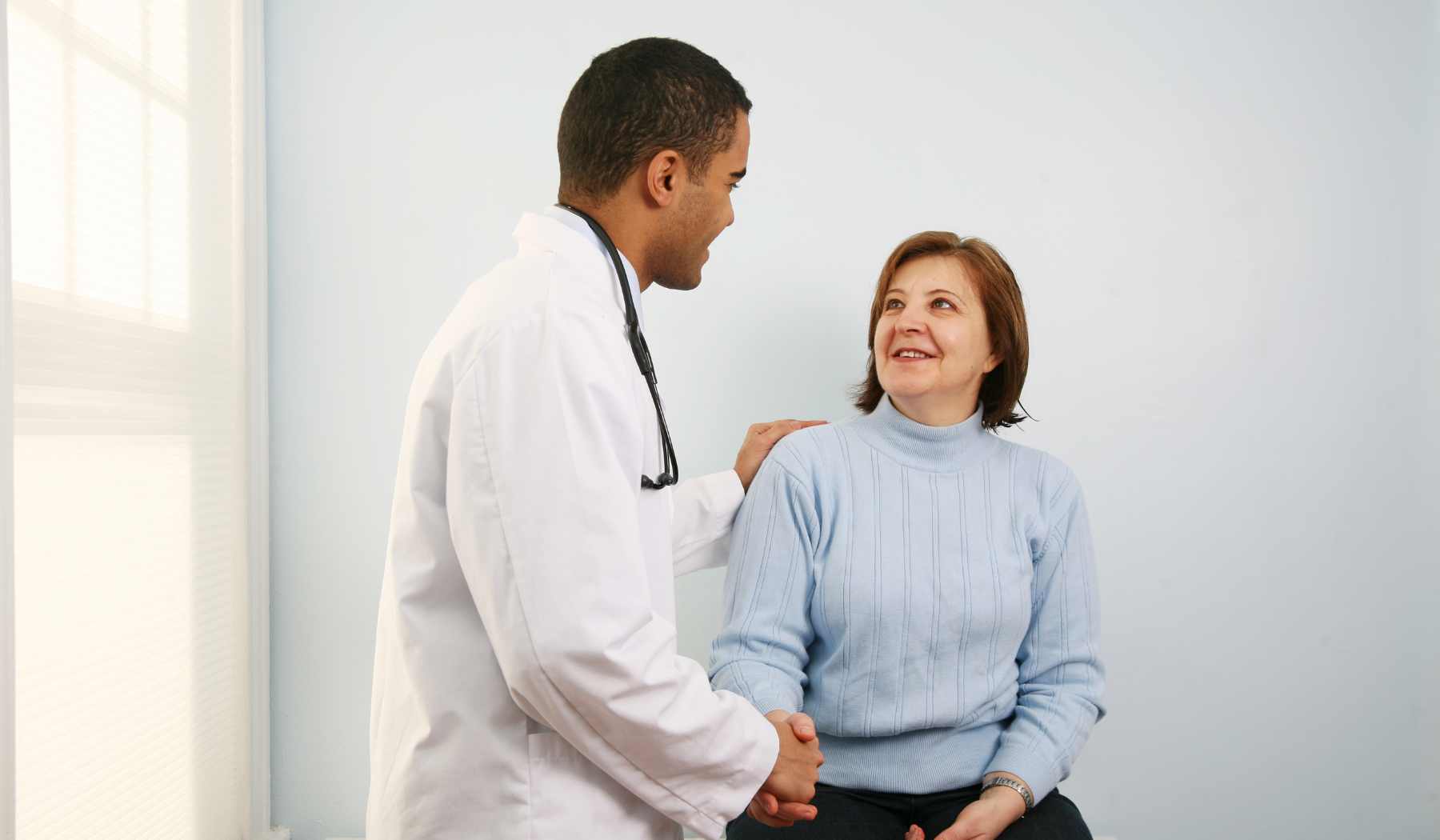 Image of doctor with patient 